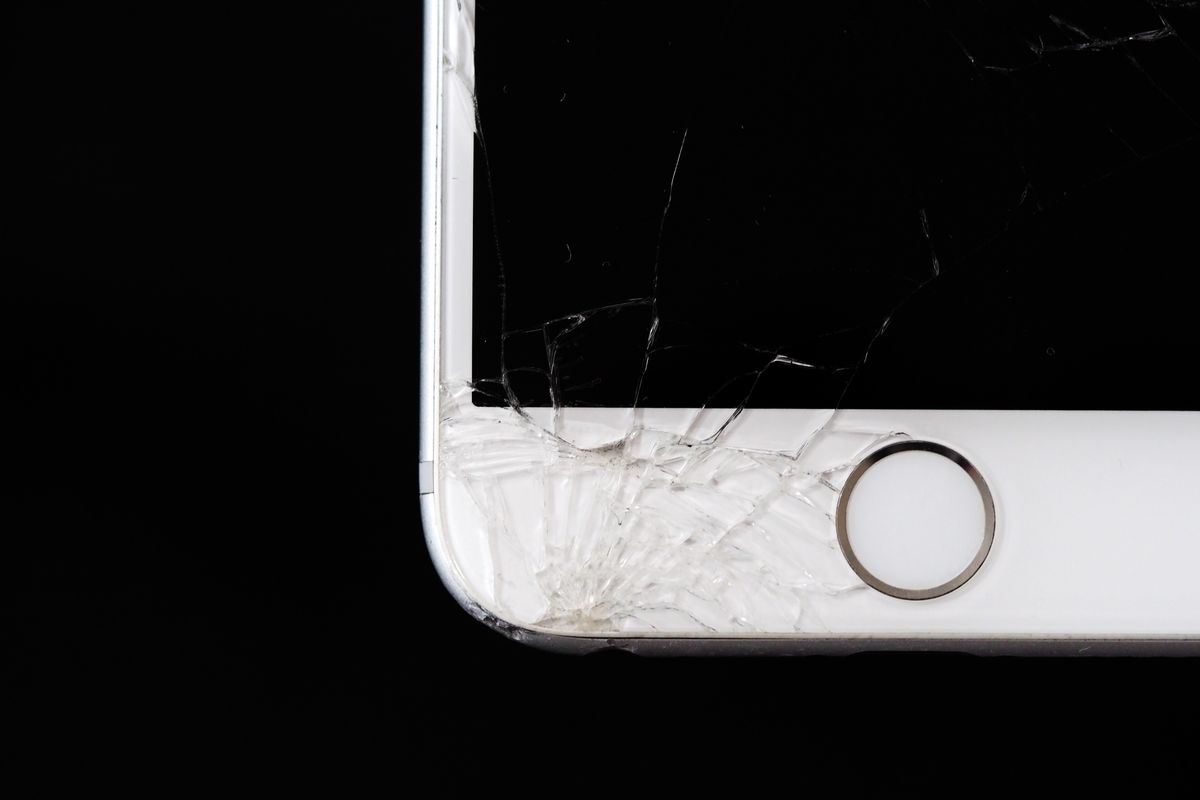 Cracked phone screen close-up